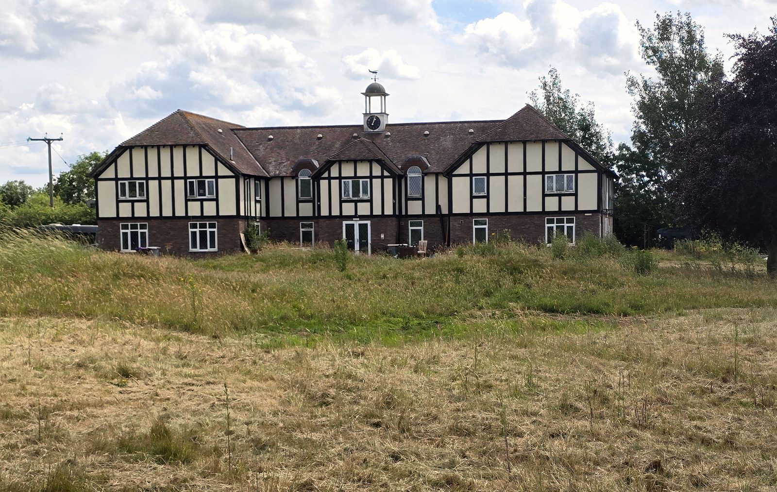 The historic clubhouse — home to the restaurant, farm shop and reception